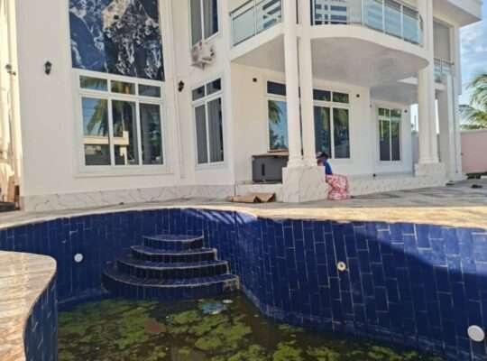 GHOROFA MPYA YENYE SWIMING POOL, ROOM 7, KITONGA