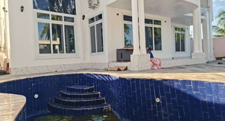 GHOROFA MPYA YENYE SWIMING POOL, ROOM 7, KITONGA