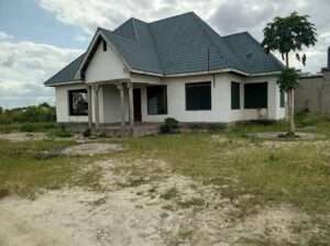 NYUMBA YENYE HATI INAUZA BANK,TZS.72 MIL,BUYUNI