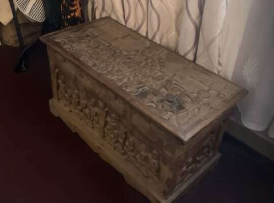 hand-carved wooden storage chest (trunk)