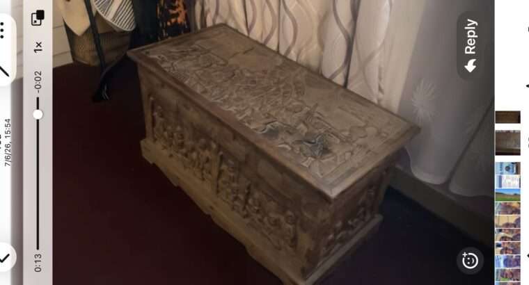 hand-carved wooden storage chest (trunk)